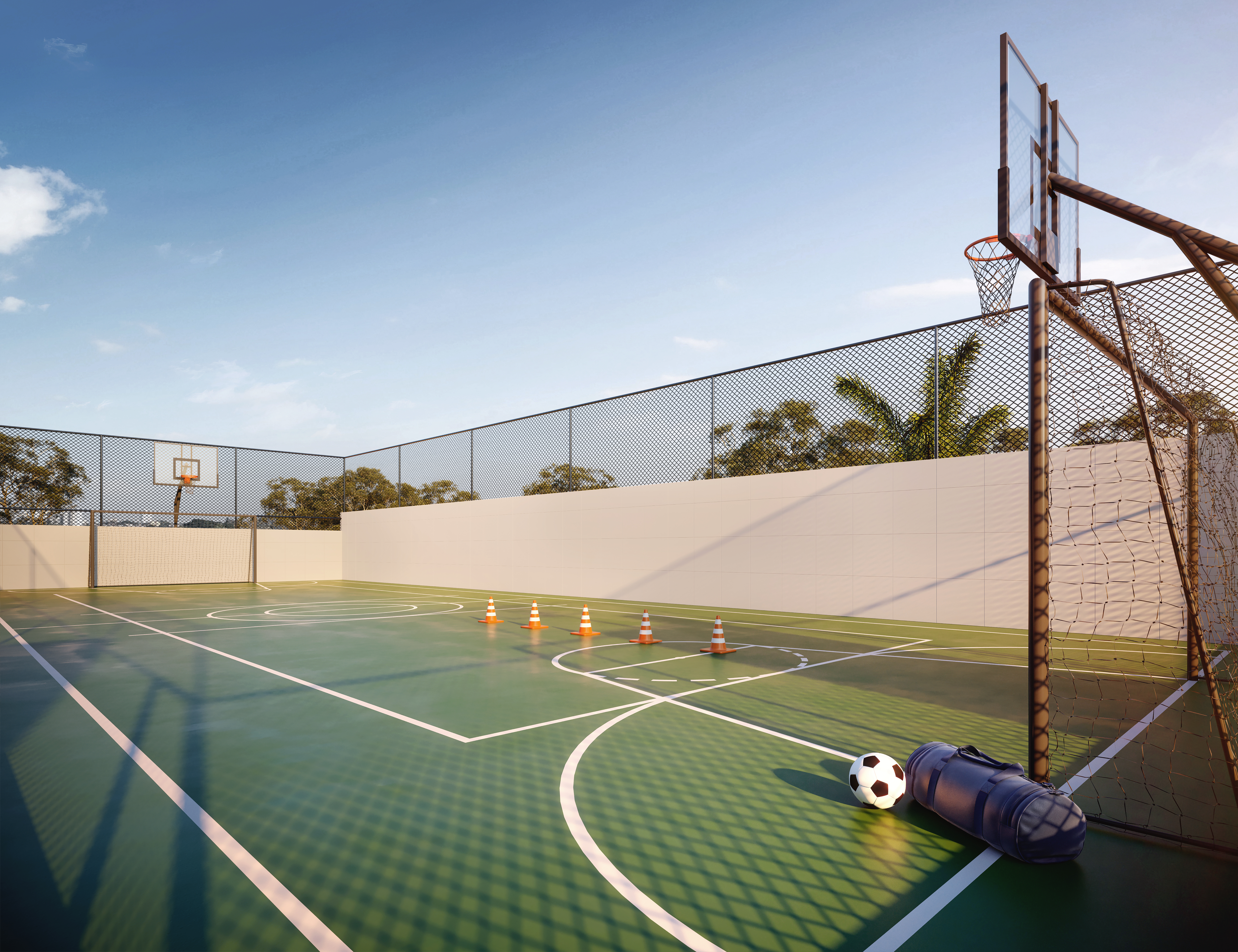 Quadra esportiva com tela de proteção e iluminação
